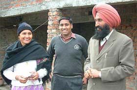 Comrade Balwinder Singh (R), his son Gagandeep and his wife Jagdish [File Photo]