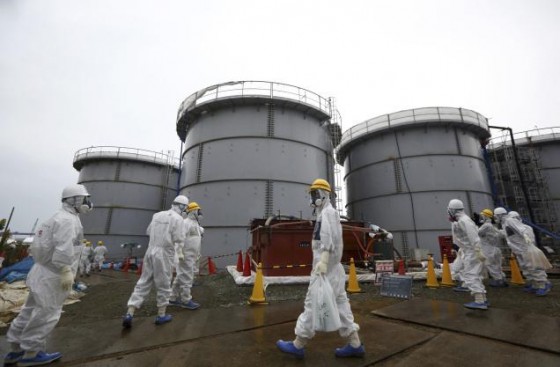 Members of the media and TEPCO employees in the H4 area at the tsunami-crippled TEPCO Fukushima Daiichi nuclear power plant in Fukushima prefecture