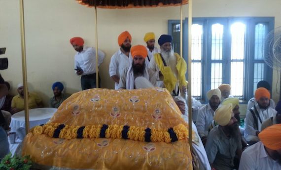 Conference is being held in the presence of Guru Granth Sahib