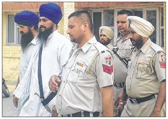 Satikar Committe leader Sukhjit Singh Khosa and another in police custody [File Photo]