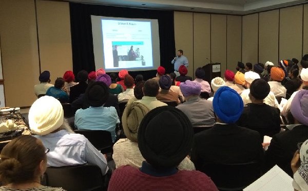 Isaac Baker of Obama media team speaking about the need for website to Sikh gurdwara representatives in Washington last year