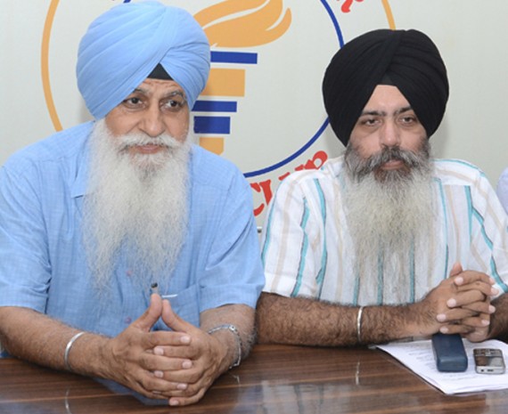 HS Dhami and Kanwarpal Singh talking to mediapersons