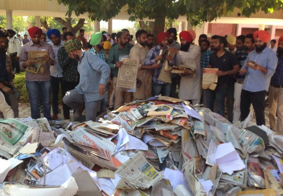 A view of documents unloaded that were being sold out by the University library