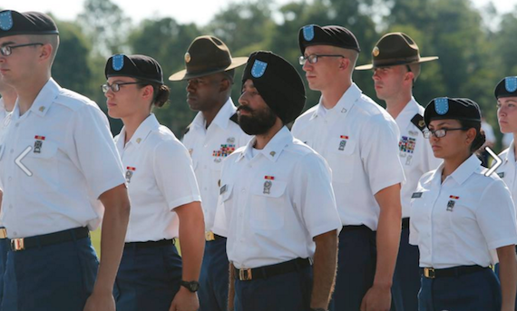 Army Specialist Harpal Singh stands with other soldiers receiving awards at the Basic Combat Training Graduation for 3RD Battalion, 60th Infantry Regiment at the U.S. Army Training Center at Fort Jackson in Columbia, SC. 