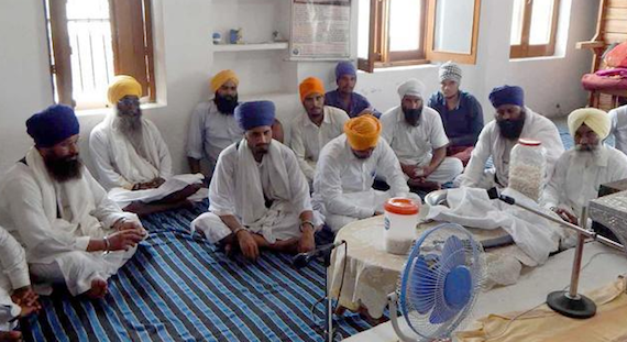 Committee members at Gurdwara Sahib after beadbi incident in Jahangir village | photo source: HT