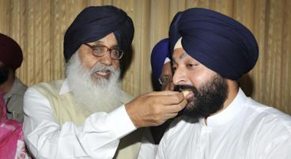 Punjab Chief Minister Mr. Parkash Singh Badal offer sweets to new elected MLA from Amritsar South Mr. Inderbir singh Bolaria after his swearing ceremony at Punjab Assembly on 29 May 2008 [File Photo]