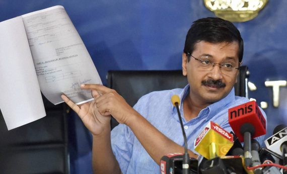 Arvind-Kejriwal-showing-papers-documents